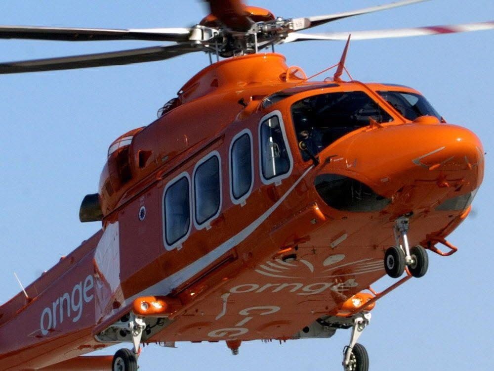 ORNGE air ambulance helicopter in flight over Ontario